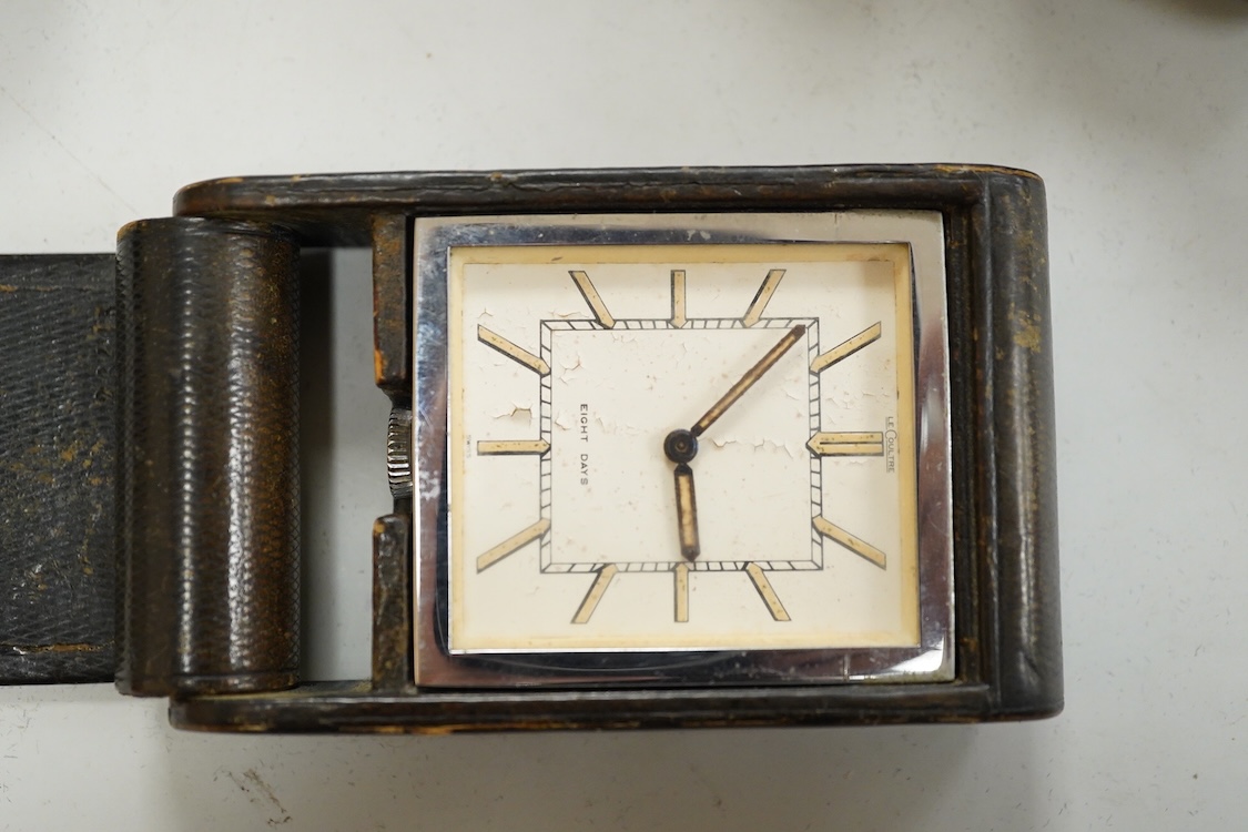 A Le Coultre desk timepiece, and four pairs of opera glasses